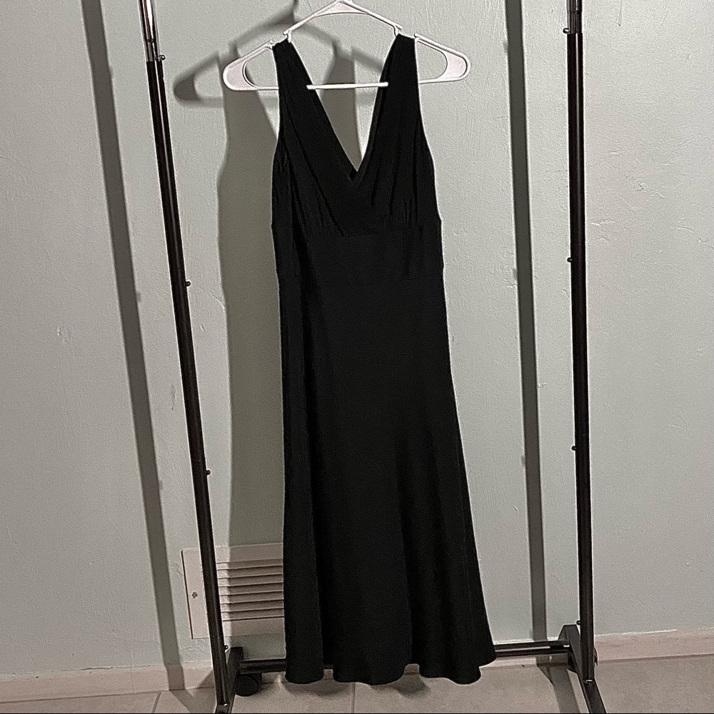 J Crew 100% silk black dress. Size 6. Excellent condition. Classy,timeless,sexy.
